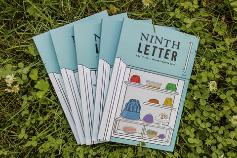 copies of Ninth Letter journal fanned out on grass