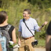 Rob Kanter speaking to students in the field