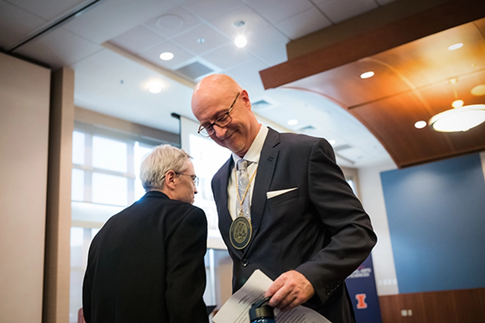 Professor Dean during his investiture ceremony as James M. Benson Professor in English
